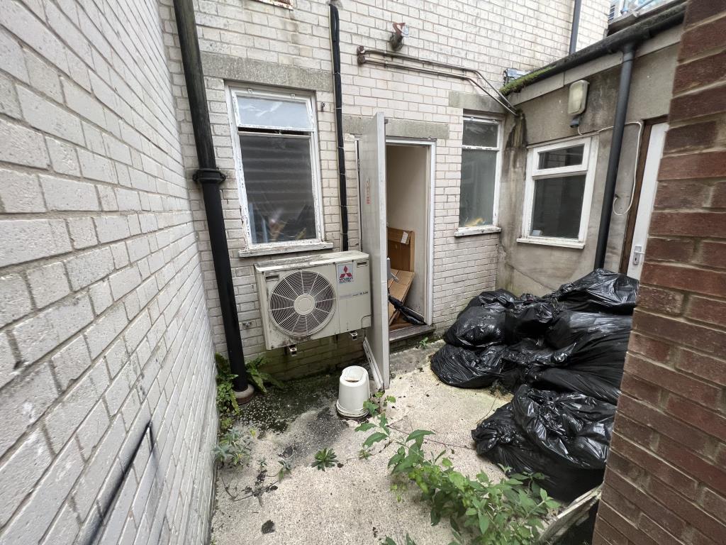 Lot: 56 - FREEHOLD TOWN CENTRE COMMERCIAL INVESTMENT - General view of rear yard